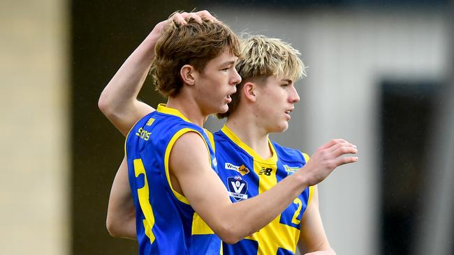 Toby Coleridge of Frankston District is congratulated by Josh Siemering. (Photo by Josh Chadwick)