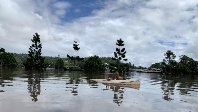 A mattress floats in flood water on March 1, 2022, a day after Lismore was hit by a record flood. Picture: Stuart Cumming
