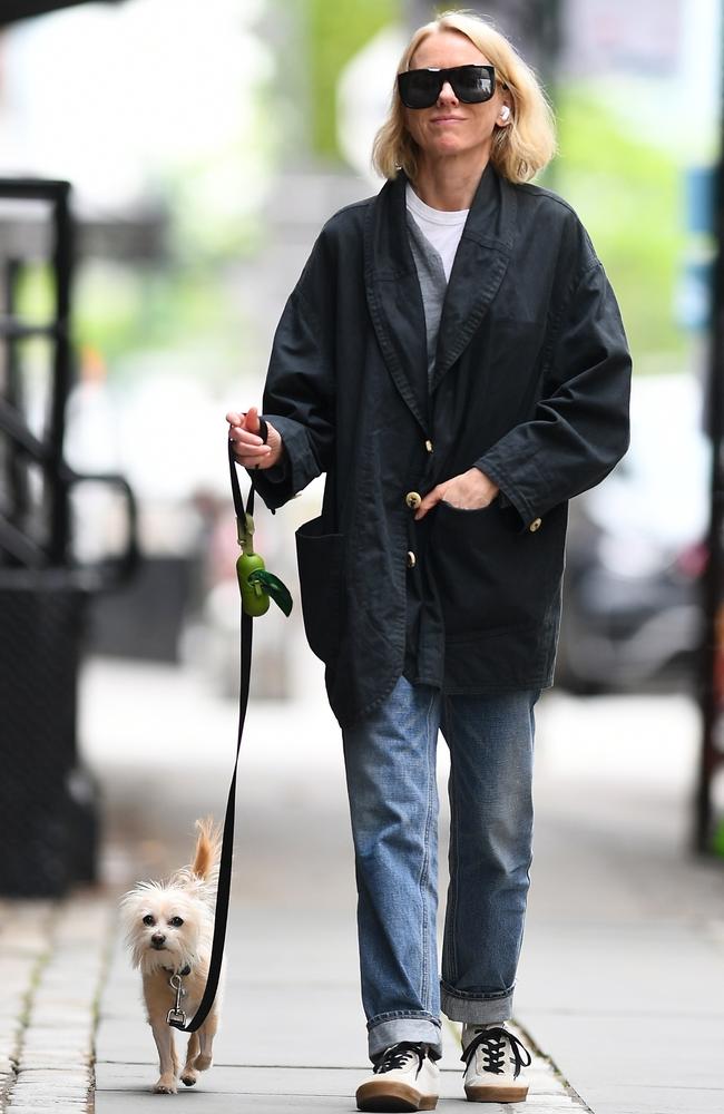 Meanwhile, Naomi Watts cut a casual figure in jeans, a white shirt, grey cardigan and black coat as she took her dog Izzy for a walk around New York. Picture: Naomi Watts BACKGRID