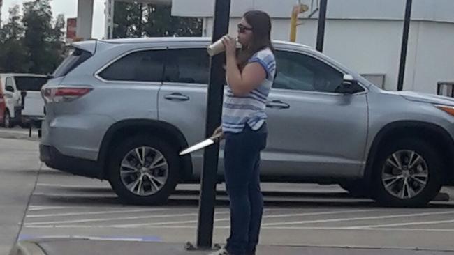 The last picture of Courtney Topic, taken as she holds a kitchen knife in the Hungry Jack’s car park. Picture: Channel 7