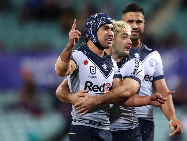 SYDNEY, AUSTRALIA - JUNE 11: Jahrome Hughes and Brandon Smith of the Storm celebrate as they watch the review for a Hughes try which was disallowed during the round 14 NRL match between the Sydney Roosters and the Melbourne Storm at Sydney Cricket Ground, on June 11, 2022, in Sydney, Australia. (Photo by Mark Kolbe/Getty Images)