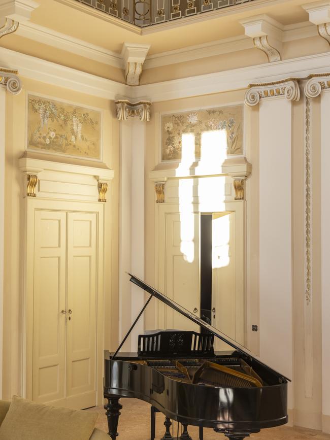 Piano in the living room of the Bellini Suite