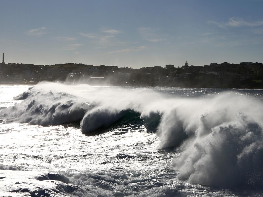 A huge swell is seen across Sydney’s Bondi Beach. Picture: Chris Pavlich