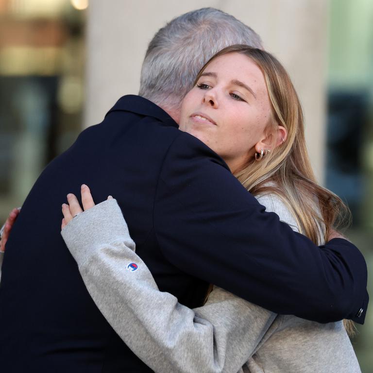 Scarlett Lovell hugs a relative after sentencing at the Supreme Court of Qld. Picture: Liam Kidston