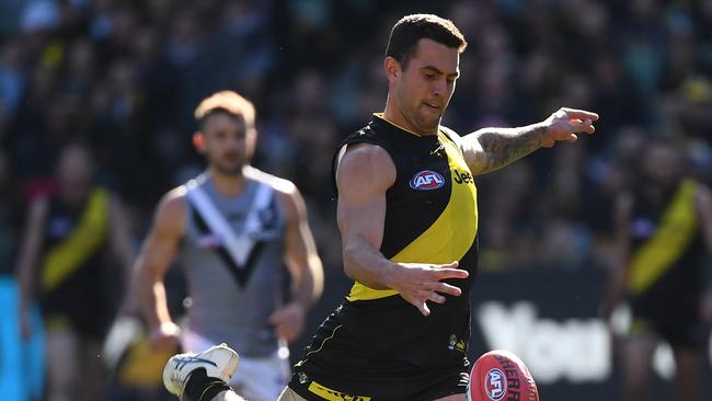 Jack Graham of the Tigers is seen in action during the Round 18 AFL match between the Richmond Tigers and the Port Adelaide Power at the MCG in Melbourne, Saturday, July 20, 2019. (AAP Image/Julian Smith) NO ARCHIVING, EDITORIAL USE ONLY