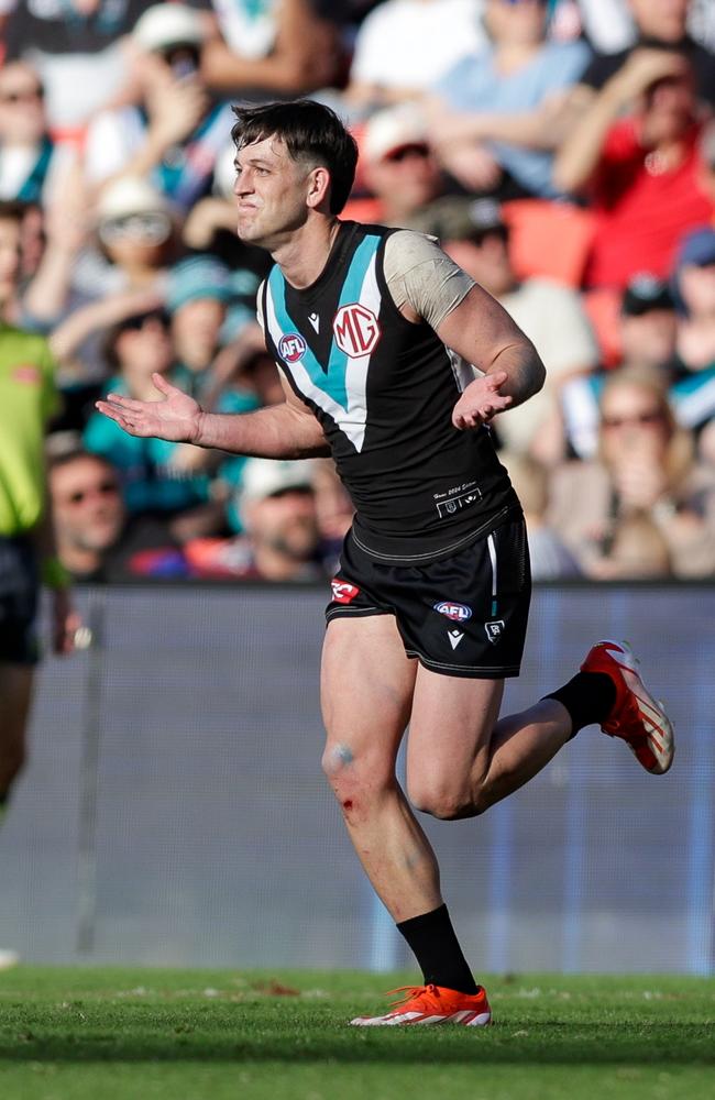 Zak Butters of the Power celebrates a goal against Gold Coast. Picture: Russell Freeman/AFL Photos via Getty Images.