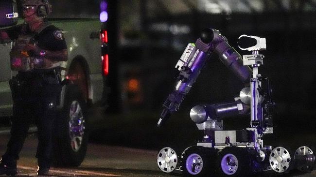 A robot is deployed into a location in Houston, Texas, where police personnel investigate the place suspected to be associated with an attacker in a deadly rampage in New Orleans. Picture: AP