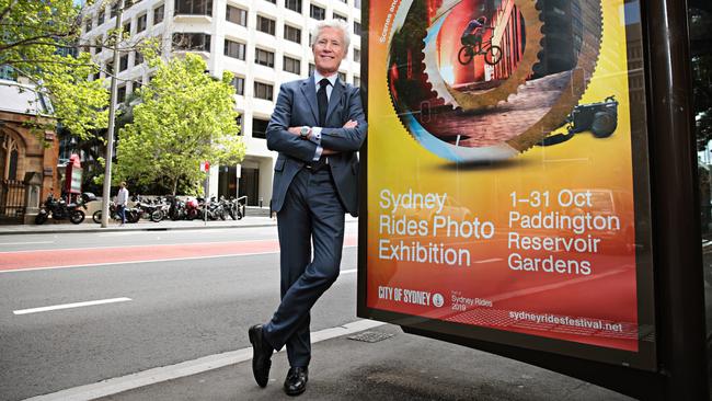 Jean-Francois Decaux with a JCDecaux sign on York Street, Sydney, last week. Picture: Adam Yip