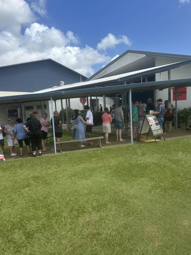 A lengthy line-up of voters at the polling booth at Tinana State School.