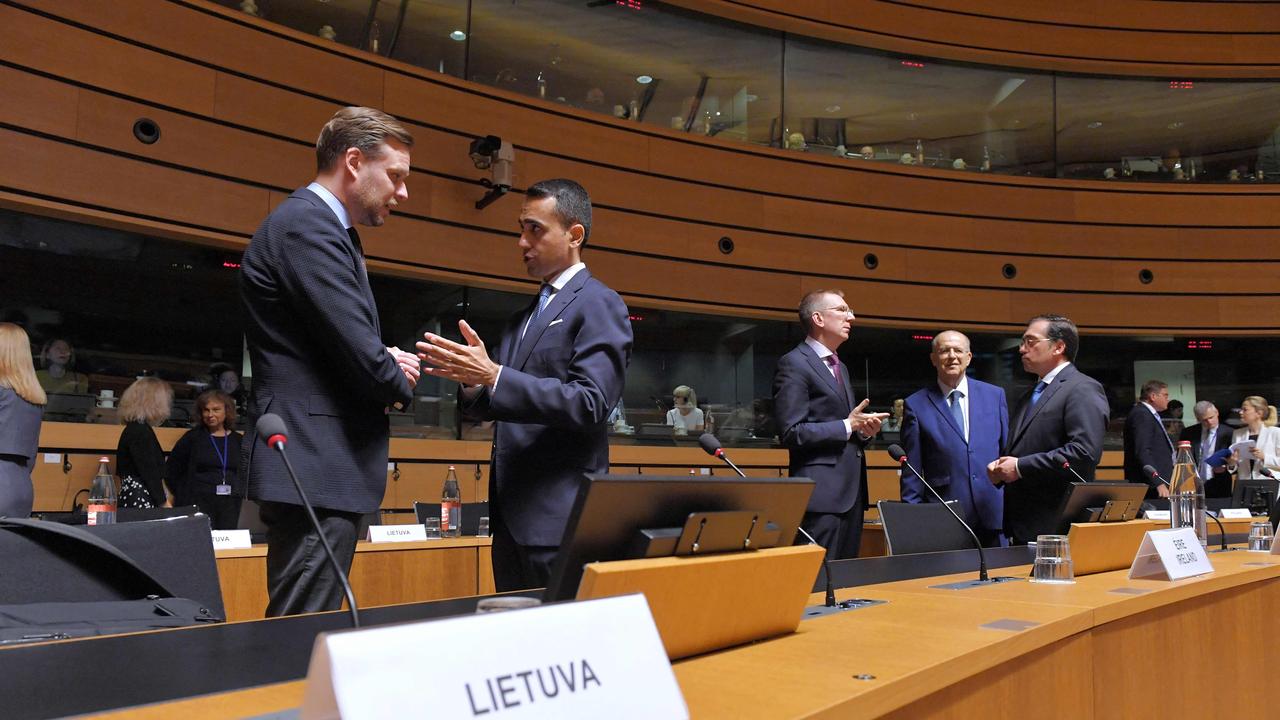 Foreign Affairs Ministers of Lithuania Gabrielius Lansbergis (L), Italy Luigi Di Maio (2nd L), Latvia Edgars Rinkevics (C), Cyprus Nikos Christodoulides (2nd R) and Spain Jose Manuel Albares Bueno (R) talk before a Foreign Affairs Council meeting at the EU Council building in Luxembourg on June 20, 2022. (Photo by JOHN THYS / AFP)