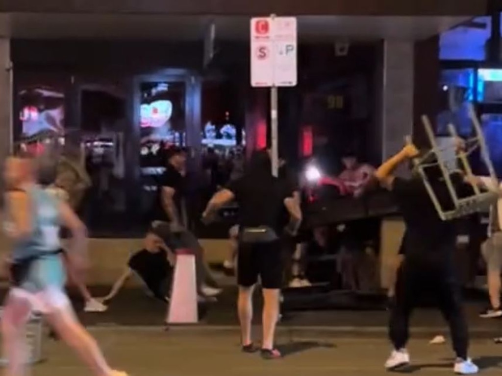 The brawl broke out on Swan St about 10.15pm.