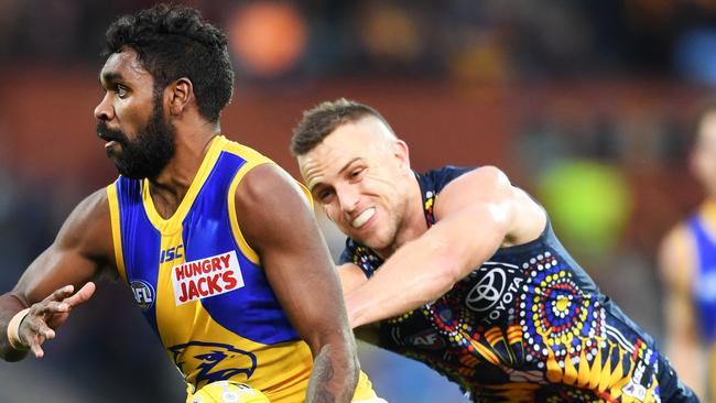 Brodie Smith latches on to West Coast speedster Liam Ryan. Picture: Mark Brake/Getty Images