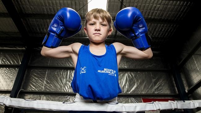 Taj Harrington, 12, at All Star Boxing in Bray Park. (AAP Image/Richard Walker)