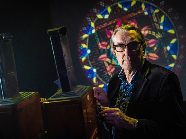 Dr Martyn Jolly recreates a 19th-century magic lantern show for ACMI's Light: Works from the Tate's Collection exhibition. Picture: Jake Nowakowski