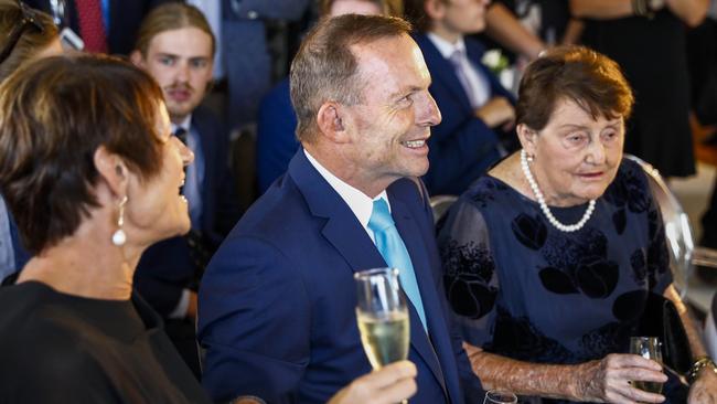 Margie Abbott (left) and Tony with mum Fay Abbott during the wedding ceremony. Picture: AAP Image/Supplied by @inlightenphotograhy