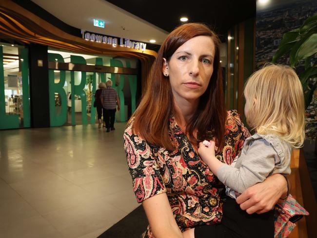 Dr Harriet Dempsey-Jones, with daughter Lyra, 2, concerned that council last week told parents toddler reading sessions have been cut, Toowong. Picture: Liam Kidston