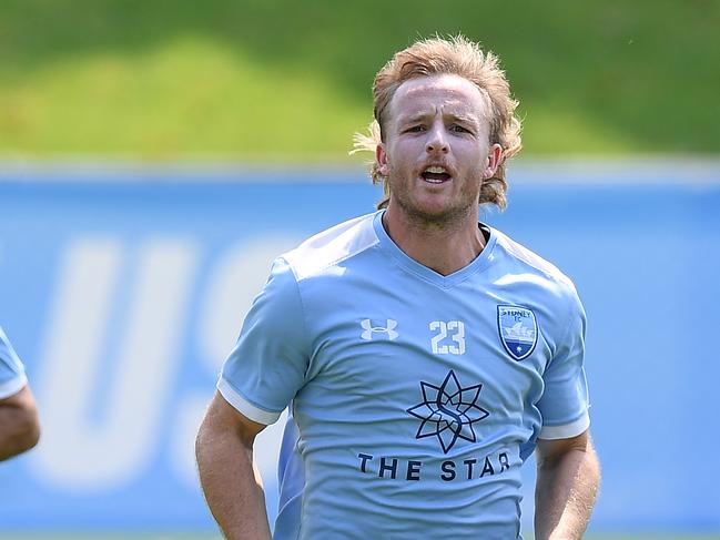 Michael Zullo, Rhyan Grant and Anthony Caceres of Sydney FC take part in a training session at Macquarie Park Sports Fields in Sydney, Friday, December 27, 2019. Sydney FC play Melbourne City on Sunday. (AAP Image/Dan Himbrechts) NO ARCHIVING