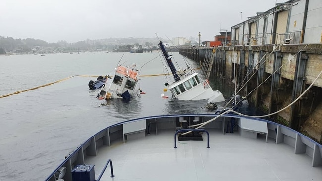 Two tug boats sinking in Devonport after being hit by cement carrier Goliath. Picture: Peter Briggs