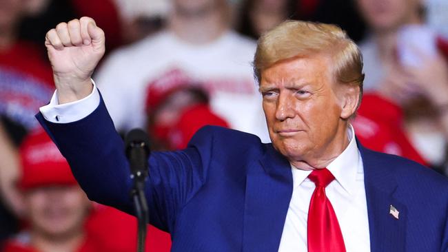 Former US President and Republican presidential candidate Donald Trump leaves the stage after a campaign rally in Pennsylvania on Saturday. Picture: AFP