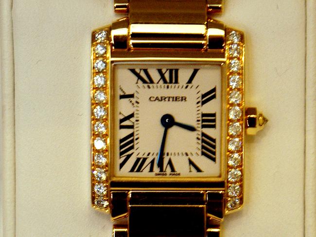 Mr Li gave Southport MP Rob Molhoek a gold Cartier ladies watch worth $26,800, similar to the one pictured.