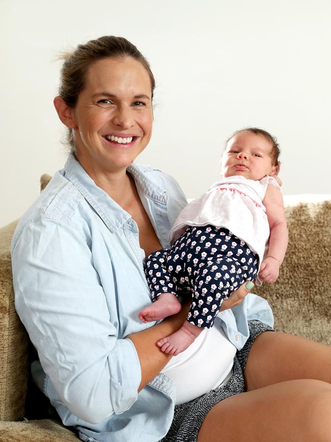 Former swimmer and Triple M radio presenter Libby Trickett at home with her newborn daughter Edwina. Picture: Liam Kidston