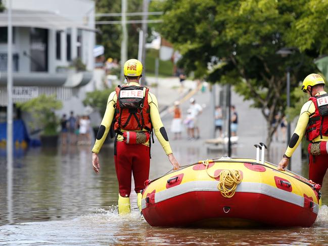 Swift water rescue crew pictured at the flood waters in Rosalie after the heavy rain storms passed through Brisbane. Picture: Josh Woning