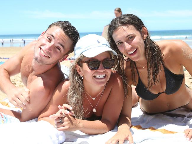 Cam Ralph, Annie Pettist and Tessa Donnithorne. Jan Juc was packed with locals and holidaymakers alike taking advantage of the perfect weather on Sunday. Picture: Alan Barber