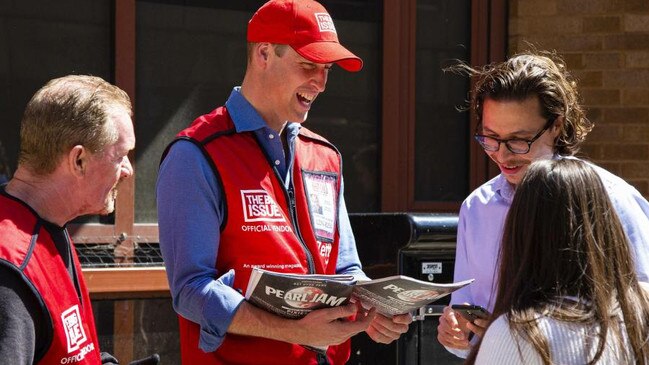 In 2022, William sold copies of the Big Issue, with vendor Dave Martin, left, to passers-by in London. Picture: The Big Issue/PA/The Times