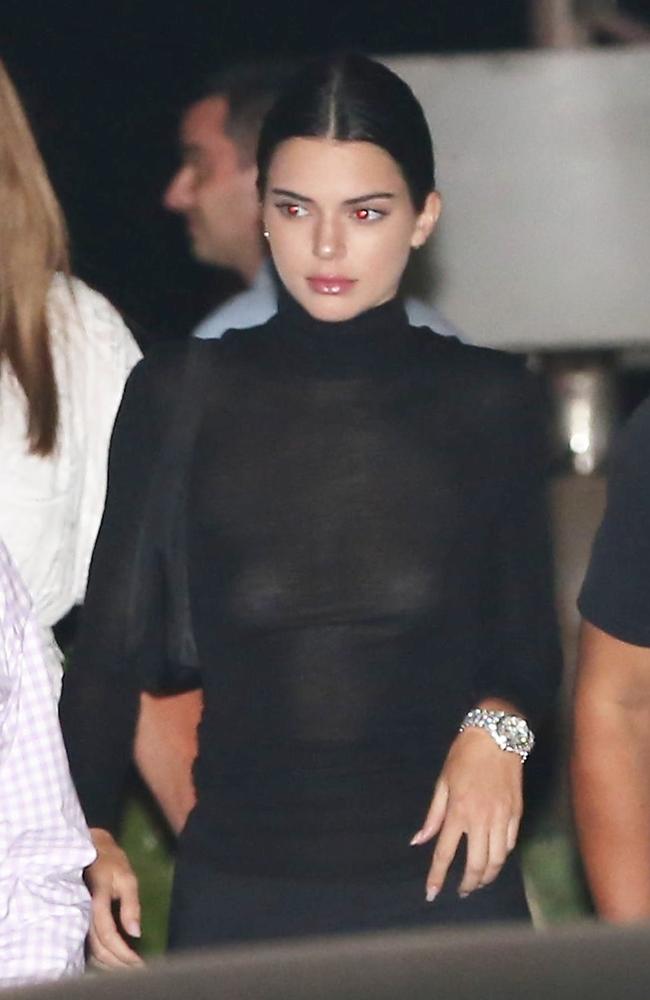 Kendall Jenner goes braless in tight sheer black dress for new