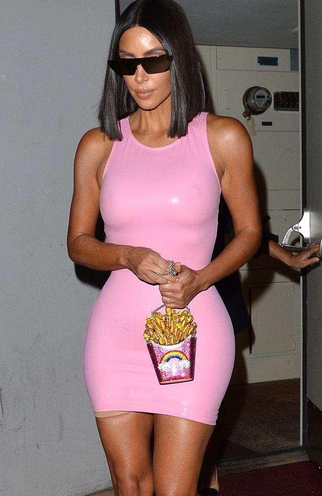 Kim Kardashian: Reality star shows nipples, Spanx in pink dress