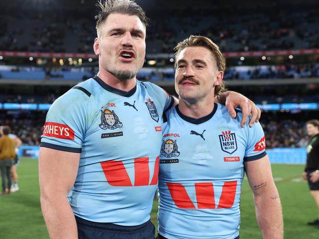 MELBOURNE, AUSTRALIA - JUNE 26:  Angus Crichton and Connor Watson of the Blues celebrate after winning game two of the men's State of Origin series between New South Wales Blues and Queensland Maroons at the Melbourne Cricket Ground on June 26, 2024 in Melbourne, Australia. (Photo by Cameron Spencer/Getty Images)