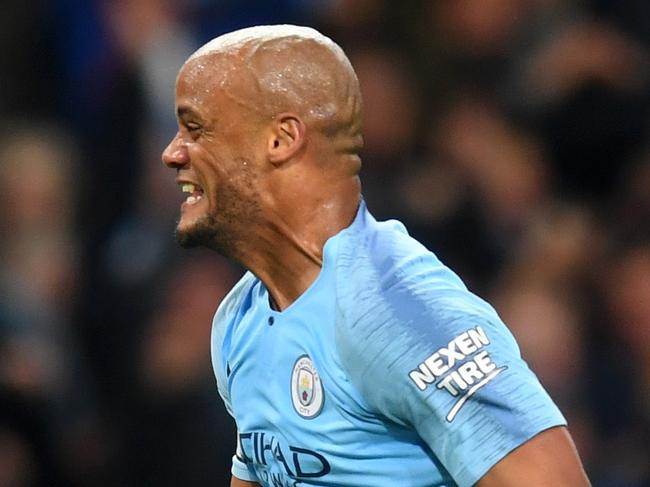 MANCHESTER, ENGLAND - MAY 06: Vincent Kompany of Manchester City celebrates after scoring his team's first goal during the Premier League match between Manchester City and Leicester City at Etihad Stadium on May 06, 2019 in Manchester, United Kingdom. (Photo by Michael Regan/Getty Images)