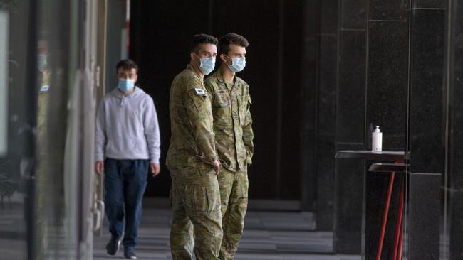 Defence force personnel outside the Pan Pacific Hotel in South Wharf, which is used to quarantine travellers. Picture: NCA NewsWire/David Geraghty