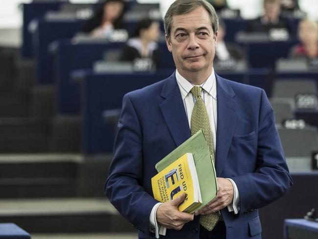 FILE - In this file photo dated Tuesday, Nov. 13, 2018, former U.K. Independence Party (UKIP) leader Nigel Farage at the European Parliament in Strasbourg, eastern France.  In a written report published Tuesday Dec. 4, 2018, Farage said that he is quitting the UKIP party over its embrace of far-right activists. (AP Photo/Jean-Francois Badias, FILE)