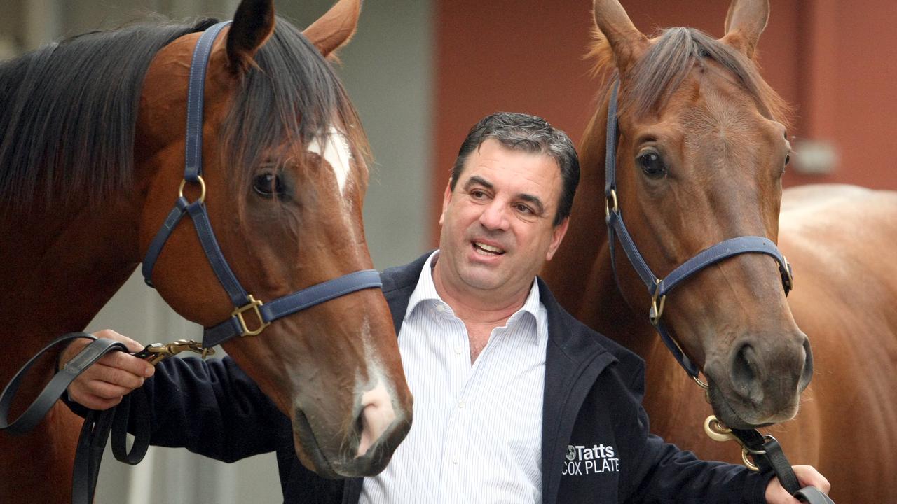 Trainer Mark Kavanagh with his winning racehorses Maldivian (L) and Whobegotyou, who won Cox Plate and AAMI Vase races respectively, at his Flemington Stables in Melbourne.