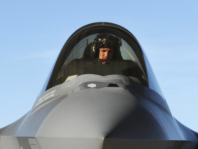 A pilot sits in the cockpit of an F-35 fighter jet preparing for a training mission at Hill Air Force Base on March 15, 2017 in Ogden, Utah. Hill is the first US Air Force base to get “combat ready” F-35's. Picture: AFP