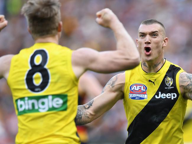 Jack Riewoldt and Dustin Martin of the Tigers react after Riewoldt kicked a goal