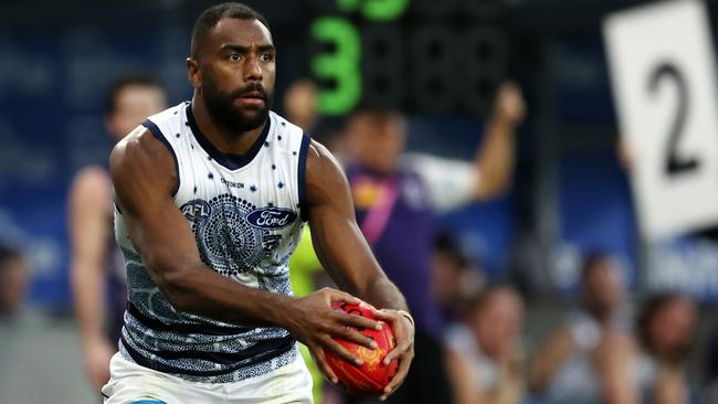 PERTH, AUSTRALIA - MAY 20: Esava Ratugolea of the Cats looks to pass the ball during the 2023 AFL Round 10 match between Walyalup/Fremantle Dockers and the Geelong Cats at Optus Stadium on May 20, 2023 in Perth, Australia. (Photo by Will Russell/AFL Photos via Getty Images)