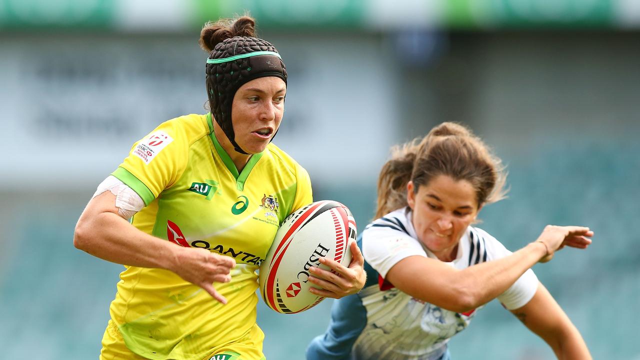 Australia’s Emilee Cherry heads for the try line during pool match between Australia and France on day one of the 2018 Sydney Sevens series. Picture: Getty Images