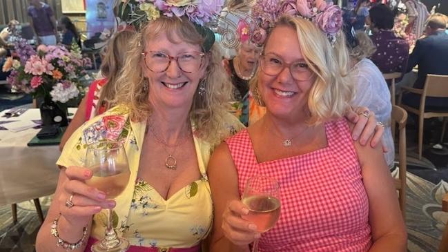 Cris Reed and Meaghan Kotzur celebrating the Melbourne Cup at Gympie RSL Club.