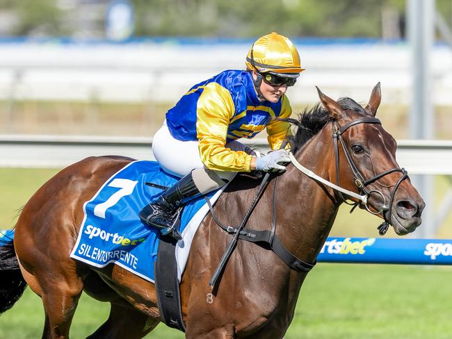 Silent Surrente, ridden by Rochelle Milnes, wins the Adelaide Cup at Morphettville on Monday. Picture: Makoto Kaneko