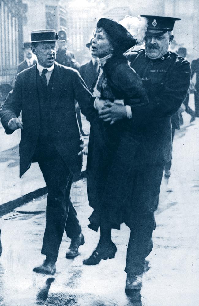 ‘Deeds not Words’ ... Emmeline Pankhurst is removed by police as she protests outside Buckingham Palace in London, 1905.