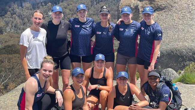 Vixens players pose after the “Big Walk” in Mount Buffalo National Park, a climb that spurred their rise back to the top of the Super Netball ladder. Pic: Supplied