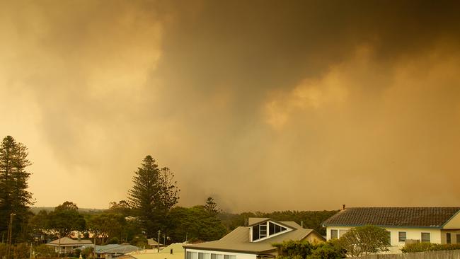 Smoke rises from a bushfire in Harrington, 335km north east of Sydney. Picture: AAP