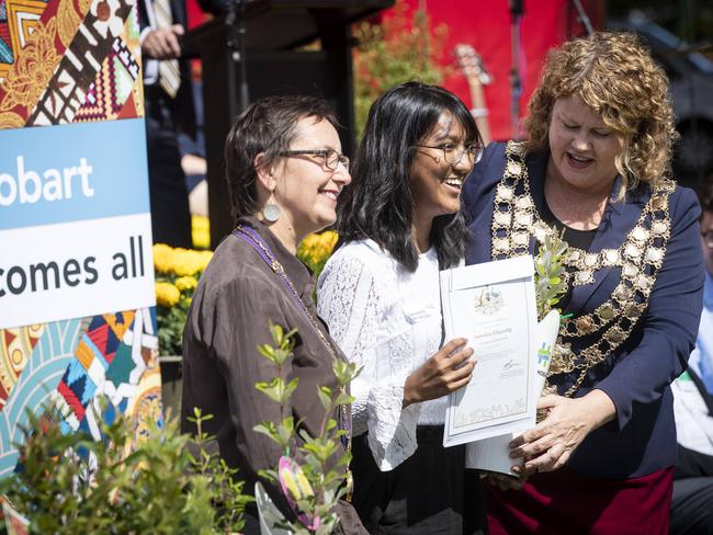 Hobart Lord Mayor Anna Reynolds congratulates a new Australian citizen at an Australia Day citizenship ceremony at the Sandy Bay in 2020. Picture: LUKE BOWDEN