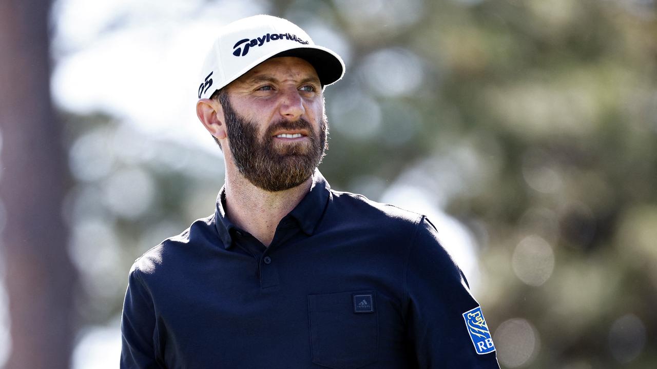 (FILES) In this file photo taken on April 15, 2022, Dustin Johnson walks off the 17th tee during the second round of the RBC Heritage at Harbor Town Golf Links in Hilton Head Island, South Carolina. - The Royal Bank of Canada ended its sponsorship of golfers Dustin Johnson and Graeme McDowell on June 1, 2022 after they were included in the field for the first event of the Saudi-backed LIV Golf Invitational Series event in England. (Photo by Jared C. Tilton / GETTY IMAGES NORTH AMERICA / AFP)