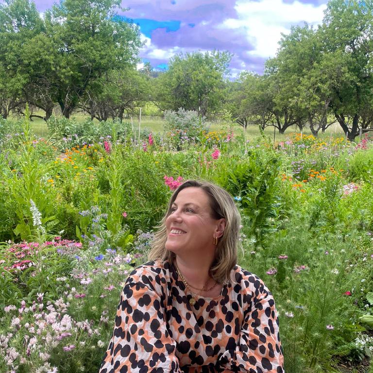 Me in a field of wildflowers just a short drive from the CBD, having just devoured a three-course feed-me menu of amazing local produce while sipping sparkling from local vineyards.