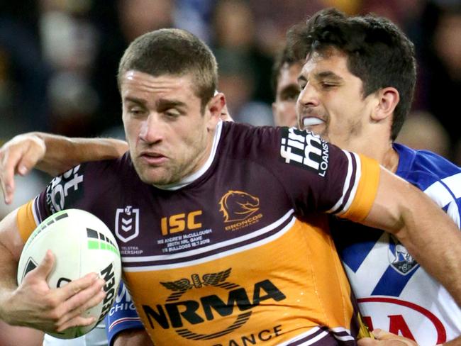 Andrew McCullough no.9,  Broncos player being tackled, Brisbane Broncos v Bulldogs, Suncorp Stadium Brisbane, on Thursday, July 18, 2019 - (AAP/Photo Steve Pohlner)