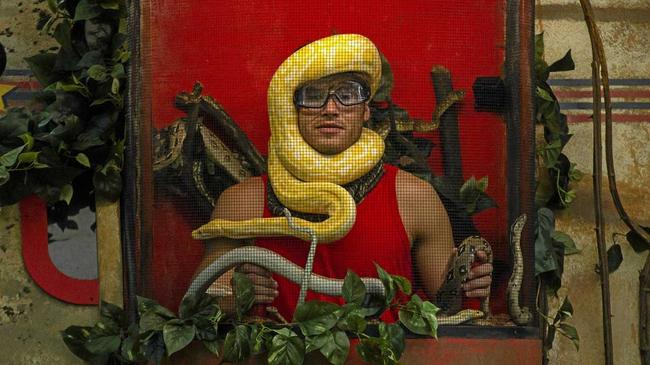 Justin Lacko gets friendly with some snakes in the first episode of I'm A Celebrity...Get Me Out Of Here! Supplied by Channel 10. Picture: Charlie Sperring