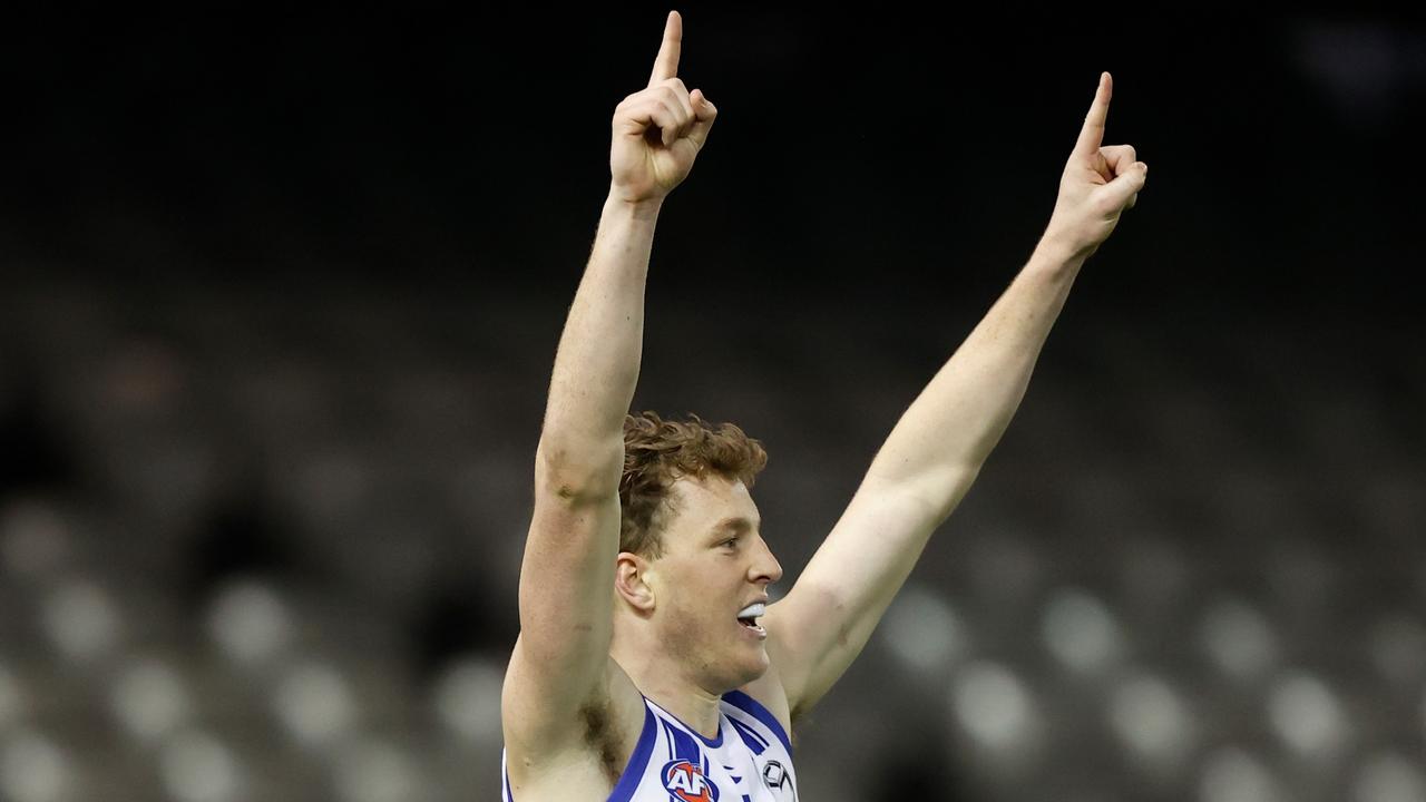 Nick Larkey celebrates one of his seven goals against Carlton.